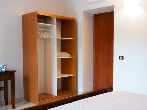 Postel nebo postele na pokoji v ubytování Hotel La Corte di Bacco