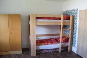 Postel nebo postele na pokoji v ubytování Chalupa pod Lysou horou