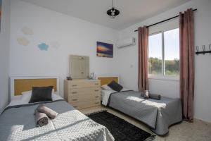 Postel nebo postele na pokoji v ubytování HORIZON-Amazing location, Sea&Nature View, 2BR,Large Balcony