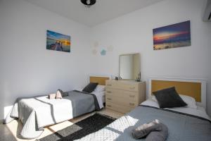 Postel nebo postele na pokoji v ubytování HORIZON-Amazing location, Sea&Nature View, 2BR,Large Balcony