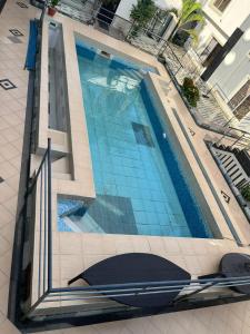 Bazén v ubytování Studio apartment GRA IKeja nebo v jeho okolí