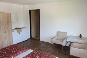 Postel nebo postele na pokoji v ubytování Chalupa pod Lysou horou