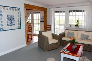 Posezení v ubytování Ferienwohnung Ebbe und Flut Galmsbüll + 22 fotografií