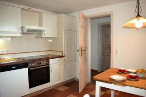 Køkken eller tekøkken på Ferienwohnung Strandläufer Galmsbüll