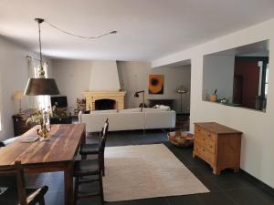 Ένα ή περισσότερα κρεβάτια σε δωμάτιο στο Casa Allègre