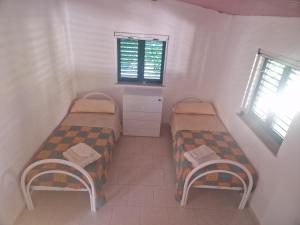 Postel nebo postele na pokoji v ubytování casa vacanza sul mare 4