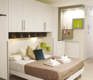 Posteľ alebo postele v izbe v ubytovaní B&B Elles con parcheggio interno