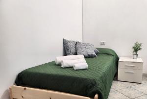 Letto o letti in una camera di Al civico 10