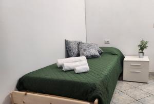 Letto o letti in una camera di Al civico 10
