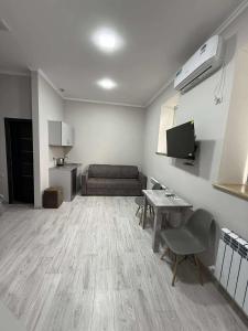 TV a/nebo společenská místnost v ubytování Bank Hotel