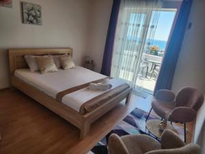 Postel nebo postele na pokoji v ubytování Adriatic Sea View Rooms