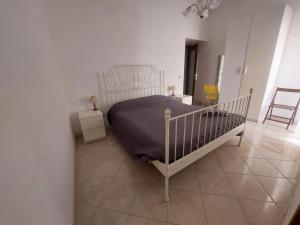 Postel nebo postele na pokoji v ubytování Fronte porto apartment 2