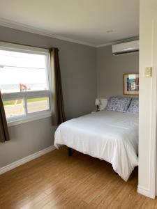 Postel nebo postele na pokoji v ubytování Motel Glenn