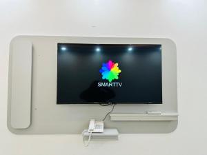 TV a/nebo společenská místnost v ubytování Zain Tabuk Apartment