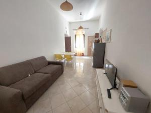 TV a/nebo společenská místnost v ubytování Fronte porto apartment 2