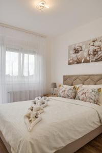 Ένα ή περισσότερα κρεβάτια σε δωμάτιο στο Apartman Stevanovic