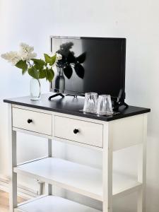 TV a/nebo společenská místnost v ubytování Fjällbacka Bed And Breakfast