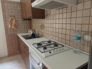 Kuchyň nebo kuchyňský kout v ubytování Fronte porto apartment 2