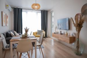 Μια τηλεόραση ή/και κέντρο ψυχαγωγίας στο Boho Apartment Sozopol
