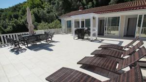 Balkón nebo terasa v ubytování PENTHOUSE STOLIV New SPA-POOL Villa is located 5m from the sea, Exclusive Terrace,Private Jetty wih Sunbeds, Pebble Beach, Secluded location Total area 375m2 at your disposal
