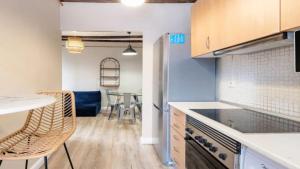 a kitchen with a counter and a dining room at Seaview Villa in Apollonii Lefkada in Athanion