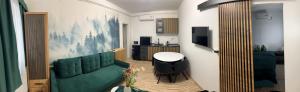 Televisyen dan/atau pusat hiburan di Nosztalgia Balaton Apartmanház