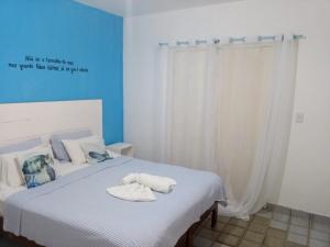 Postel nebo postele na pokoji v ubytování Pousada Recanto do Norte