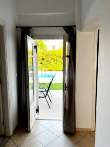 The swimming pool at or close to "Villa Kanavos" apts