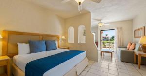 Postel nebo postele na pokoji v ubytování Park Royal Homestay Los Cabos