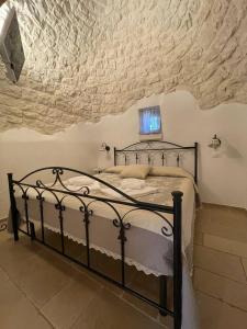A bed or beds in a room at La linea dell'orizzonte
