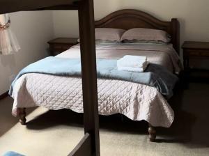 Pequeno Paraiso客房内的一张或多张床位