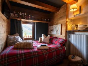 Postel nebo postele na pokoji v ubytování chalet Sestriere