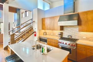 a kitchen with a sink and a stove at Truckee Mountain Retreat in Truckee