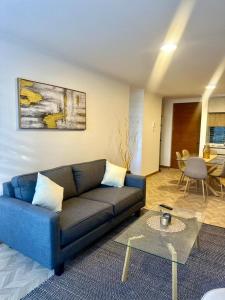 Χώρος καθιστικού στο Amplio y equipado departamento