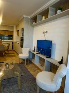 Χώρος καθιστικού στο Amplio y equipado departamento +8 φωτογραφίες