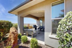 a porch of a home with a view of the ocean at The Desert Star Villa in Washington