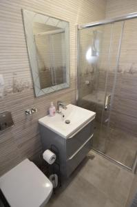 Et badeværelse på Vila Galleon + 13 billeder