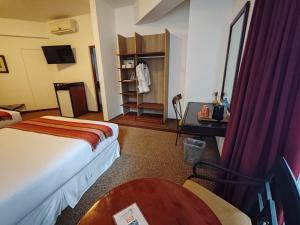 TV a/nebo společenská místnost v ubytování Tierra Viva Machu Picchu Hotel