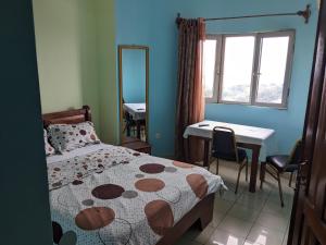 Postel nebo postele na pokoji v ubytování GRÂCES hôtel