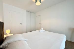 Posteľ alebo postele v izbe v ubytovaní Péristyle - T2 de standing neuf - Balcon