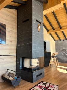 TV a/nebo společenská místnost v ubytování Paradiso View Villa