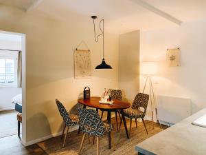 a dining room with a table and chairs at Villakraft in Bad Gastein