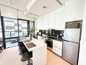 Kuchyň nebo kuchyňský kout v ubytování Pixel Studio withBalcony Lake View Free Parking 1405