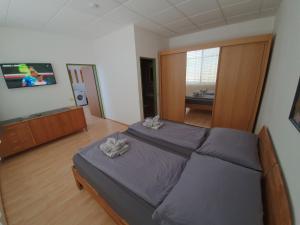 Rúm í herbergi á Grössingblick