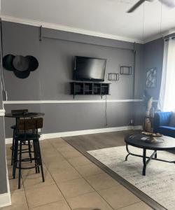 TV a/nebo společenská místnost v ubytování Suspence Property