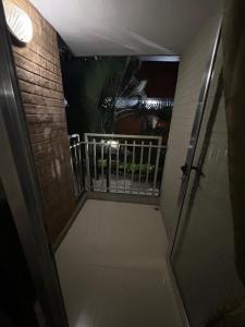 a stairway leading to a balcony in a building at Apartment in Bello in Medellín