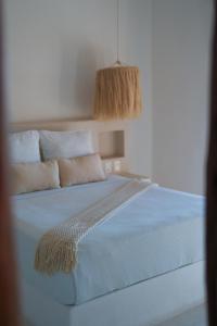 Postel nebo postele na pokoji v ubytování Mis Sueños Holbox
