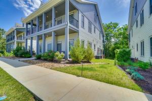 an apartment building with a sidewalk in front of it at Walk to Historic Maryville True Southern Getaway! in Maryville