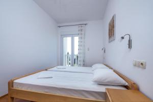 Posteľ alebo postele v izbe v ubytovaní Apartment in Duce with sea view, terrace, air conditioning, WiFi 3423-3