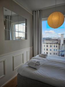 Ένα ή περισσότερα κρεβάτια σε δωμάτιο στο 1 bedroom apartment with city views